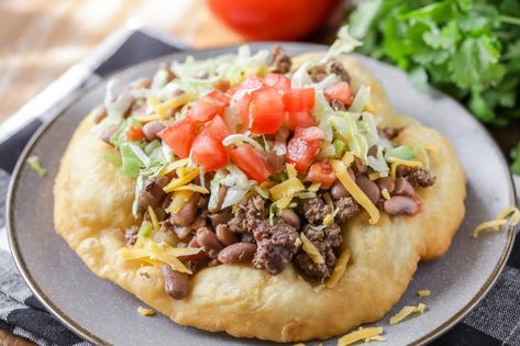 Delicious Homemade Fry Bread - aka "Navajo Tacos" or "Indian Bread" - one of the best recipes you'll ever try! Pillows of dough fried until it's a little crispy on the outside, but soft on the inside. Make it sweet or savory! Indian Fry Bread Recipe Easy, Indian Taco Recipes, Fry Bread Tacos, Fry Bread Recipe, Navajo Tacos, Indian Tacos, Fried Bread Recipe, Bread Recipe Video, Homemade Fries