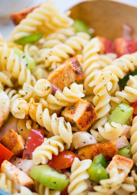 Chicken pasta salad for summer barbecues, picnics, or a light lunch. Grilled chicken, pasta, and veggies tossed in a refreshing Lemon-Herb Dressing are so delicious. Grilled Chicken Pasta Salad, Chicken Breast Pasta, Grilled Chicken Pasta, Chicken Pasta Salad Recipes, Summer Pasta Salad Recipes, Herb Dressing, Pasta Salad Dressing, Cheesy Chicken Broccoli, Easy Chicken Breast