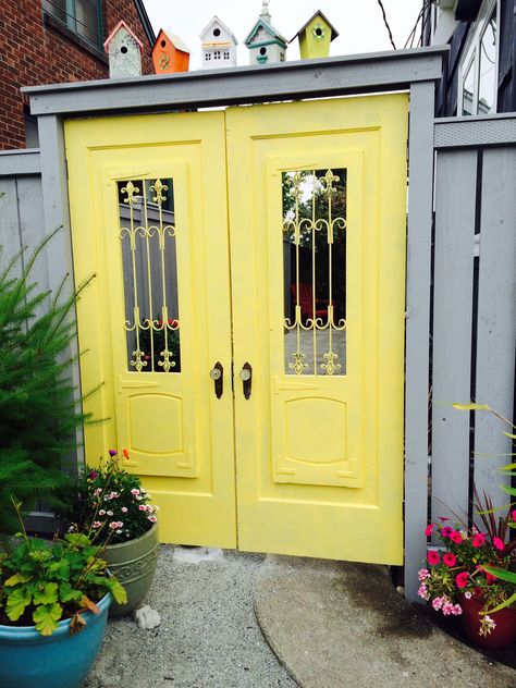 My almost finished project - upcycling original interior doors from my 1930s bungalow to become a garden gate for my new fence, including the original glass door knobs.  I bought Benzara wood panels with the scroll work (made for wall decor) and had openings cut in the door. 1930s Bungalow, Gate Fence, Yellow Garden, Garden Steps, Glass Door Knobs, Outdoor Stuff, Scroll Work, Old Bricks, Wood Panels