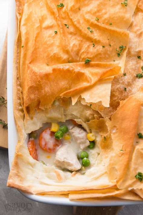 Use leftover turkey and frozen vegetables in this Healthy Easy Turkey Pot Pie recipe to serve a quick and light dinner. It uses phyllo sheets instead of puff pastry and there’s no heavy cream OR butter in the filling! | savorynothings.com @savorynothings Turkey Pot Pie Recipe Easy, Turkey Pot Pie Easy, Easy Leftover Turkey Recipes, Pot Pie Recipe Easy, Turkey Pot Pie Recipe, Healthy Chicken Pot Pie, Phyllo Recipes, Turkey Pie, Savory Pies Recipes