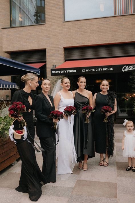 Black Bridesmaid Dresses Red Bouquet, Black Bridesmaid Dresses Red Flowers, Black Bridesmaid Dress Mismatched, Bridesmaid Suits, Modern Gown, Contemporary Bridal, Red Bouquet, Black Attire, Black Bridesmaids