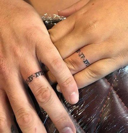 Tatoo Ring, Tattoo Ideas For Couples, Husband Ideas, Wife Ring, Ring Tattoo Designs, Roman Tattoo, Wedding Band Tattoo, Cute Couple Tattoos, Roman Numeral Tattoos