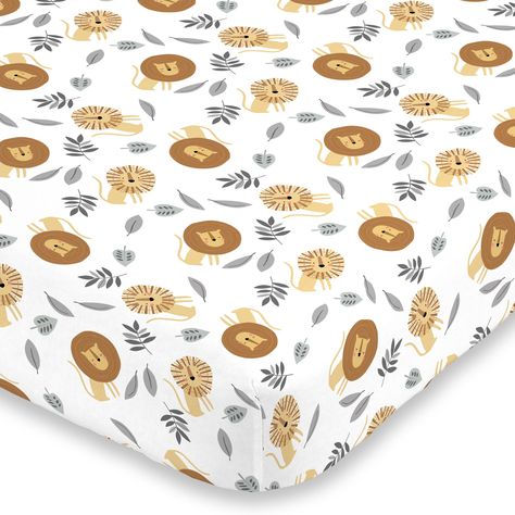 Your little one will sleep soundly on this crib sheet's cozy surface Lion design. Features a multi print of lions in colors of yellow, brown, grey and white, making this microfiber fitted crib sheet perfect for almost any baby's nursery! Measures 52" x 28" x 8" with elastic all the way around for a perfectly snug fit on any standard size crib mattress.  Material: 100% Polyester Wash Care: Machine Wash Imported Cozy Sheets, Lion Nursery, Mini Crib Sheets, Yellow Fits, Lion Design, Baby Nursery Furniture, Mini Crib, Soft Bedding, Fitted Crib Sheet