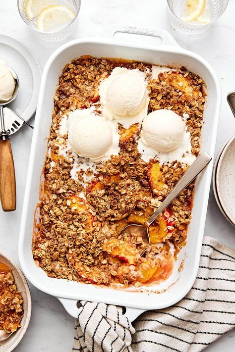 This easy peach crisp recipe made with fresh peaches and a crumble oatmeal topping is the best way to celebrate summer desserts! Plus, it's completely gluten-free and can be made with frozen peaches as well. Peach Things, Downshiftology Recipes, Breastfeeding Meals, Easy Peach Crisp Recipe, Easy Peach Crisp, Peach Crisp Recipe, Crisp Desserts, Sliced Peaches, Easy Cakes To Make