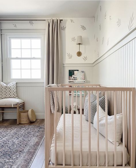 Neutral Nursery With Panelling, Double Nursery Ideas, Bead Board And Wallpaper Nursery, Beige Crib Nursery, Gender Neutral Nursery Board And Batten, Batton Board Nursery, Sea Salt Sherwin Williams Nursery, Low Ceiling Nursery, Nursery With Beadboard Walls