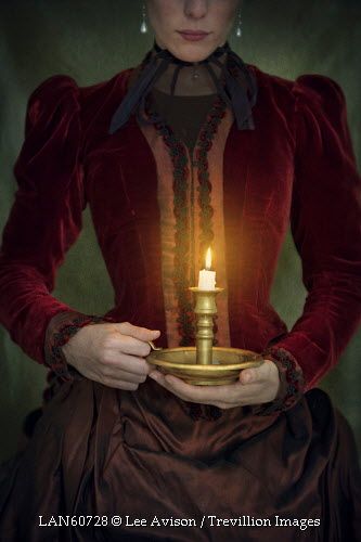 Trevillion Images - historical-victorian-woman-holding-candle-inside Woman Holding Candle, Hand Holding Candle, Holding Candle, Victorian Aesthetic, Victorian Women, Random House, Drawing Poses, Historical Fiction, After Dark