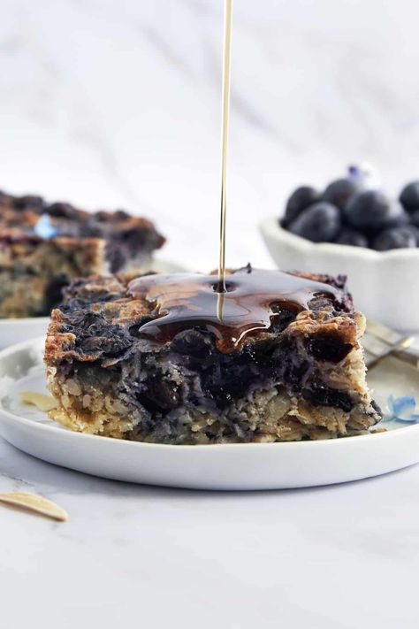 Blueberry baked oatmeal is the best make-ahead breakfast that’s packed with nutrients and flavor! Ready in just around 30 minutes, it’s simple, easy to customize, and perfect for the whole family. Banana Blueberry Baked Oatmeal, Blueberry Baked Oats, Budget Bites, Blueberry Baked Oatmeal, Oatmeal Blueberry, Blueberry Oatmeal Bake, Food Dolls, Blueberry Breakfast Cake, Better Breakfast