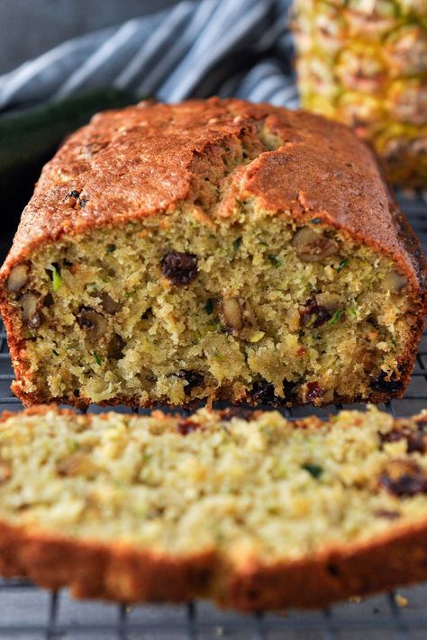 With a tender crumb & refreshing tropical flavor, this pineapple zucchini bread recipe is the most delicious way to use up extra zucchini! Zucchini Bread With Pineapple, Pineapple Zucchini Bread, Zucchini Pineapple Bread, Zucchini Pineapple, Zucchini Loaf, Best Zucchini Bread, Best Zucchini, Zucchini Bread Recipe, Pineapple Recipes