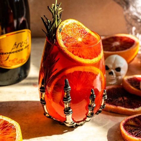 Blood Orange Drink, Gomez Morticia, Cream Puff Dessert, Puff Dessert, Halloween Punch, Gomez And Morticia, Italian Soda, Blood Orange Juice, Orange Drinks