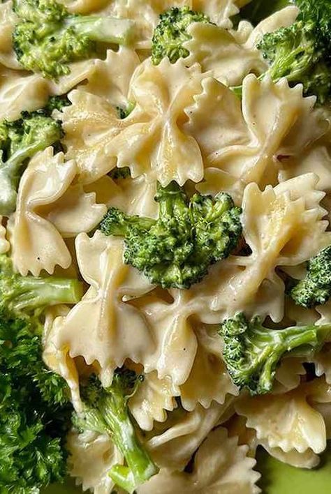 This broccoli Alfredo pasta with bright green broccoli florets and bow-tie pasta in a creamy Parmesan sauce, takes under a half hour. Hamburger Broccoli Alfredo, Chicken Broccoli Alfredo Bowtie Pasta, Macaroni With Broccoli, Bow Tie Broccoli Pasta, Pasta And Broccoli Recipes Simple, Brocolli Pasta Dishes, Creamy Pasta Recipes Vegetarian, Recipes With Bow Tie Pasta, Broccoli Bowtie Pasta