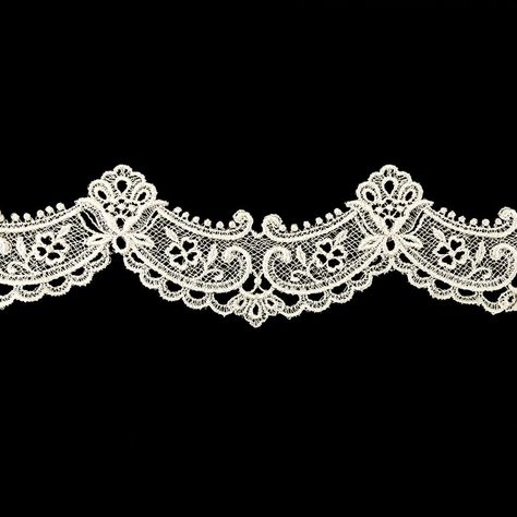 Following the animated pattern produced by an orchestra conductor’s finger tips, our Beige Classical Scroll Lace Trimming is soon to be your new favorite tune. Intricately detailed, this piece follows a wavy, almost melodic sequence. It is filled with a netted design and 4-leaf flowers as well as delicate looping details both on the top and the bottom. Use this piece to create texture and movement on the hem of a blouse or dress, as a collar detail on a Victorian-inspired top, or as a belting de Stain Stitch, Victorian Fabric, Pola Bordir, Victorian Pattern, Black Color Hairstyles, Color Hairstyles, Finger Tips, Mood Fabrics, Victorian Lace