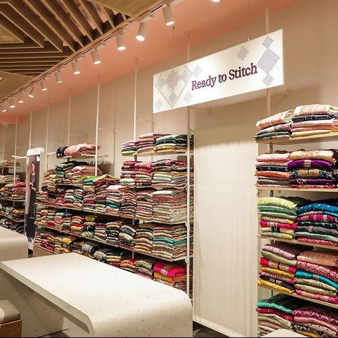 Fabric Rack Display, Saree Shop Interior Design, Small Boutique Interior Design Indian, Cloth Showroom, Small Boutique Interior Design, Saree Showroom, Clothes Rack Design, Fabric Shop Display, Clothing Showroom