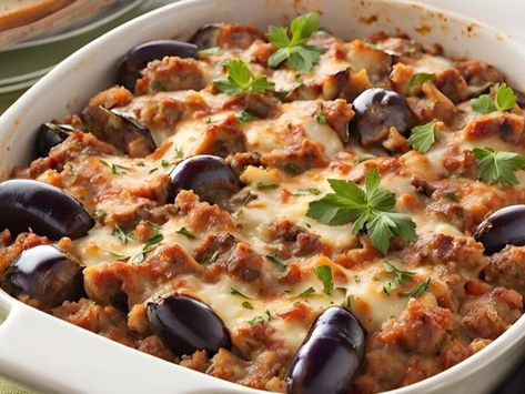 Hearty Sausage and Eggplant Bake | The Foodie Fix | NewsBreak Original Eggplant And Sausage Recipes, Eggplant Bake, Cheese Enchilada Casserole, Green Chili Casserole, Ground Turkey Casserole, Chicken Potato Casserole, Eggplant Casserole, Chili Casserole, Turkey Casserole