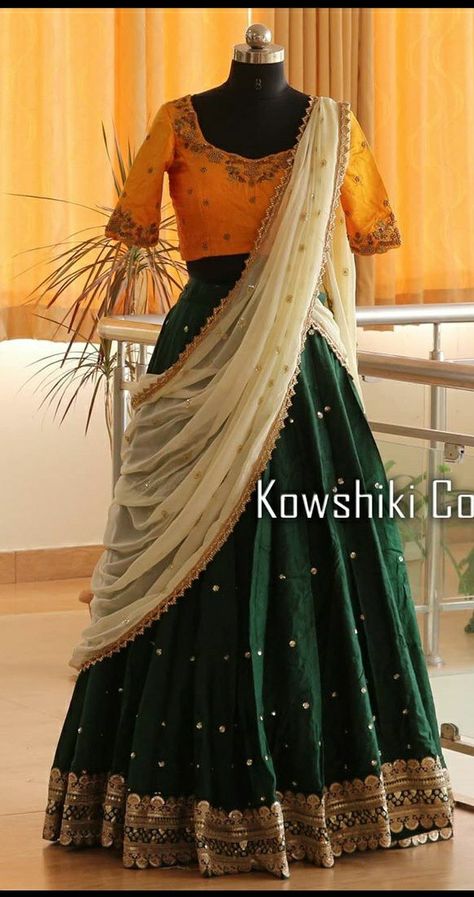 Dark Green Langa Voni, Latest Colour Combination In Lehenga, Half Sarees Simple, Halfsarees Traditional Simple, Green Pattu Half Saree, Lehanga Models For Stitching, Fancy Half Sarees Latest Designs, Traditional Lehanga Designs Latest, Halfsarees Designer Latest