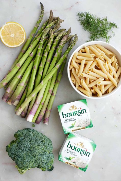 Enjoy this easy recipe for pasta with roasted asparagus and broccoli, coated in baked Boursin cheese! It's a fresh pasta bake that's perfect for a springtime dinner for the whole family. Broccoli Boursin Pasta, Baked Boursin Cheese, Asparagus And Broccoli, Easy Pasta Bake, Baked Boursin, Asparagus Pasta Recipes, Asparagus Broccoli, Asparagus Pasta Salad, Recipe For Pasta