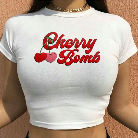 🍒Chery Bomb🍒 Crop Top in stock now! Make a statement with this ultra-stylish baby tee! This crop top is crafted from a soft cotton-spandex blend and features a bold "CHERRY BOMB🍒" graphic on the front. It has a slim fit, a crew neckline, and short sleeves, perfect for that Y2K aesthetic. 5% discount code special for Instagram: INSTAGRAM5 Aesthetic Emo, Emo Girl, Gothic Grunge, 2000s Aesthetic, Y2k Clothes, Vintage Women, Baby Tee, Crop Tops