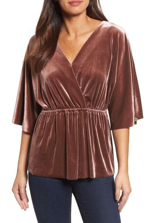 Halogen Faux Wrap Velvet Top | We're crushing on velvet. The holiday season is upon us, and you know what that means: It's time to look the part. There's nothing quite as festive as a little velvet this time of year and these budget-friendly picks (all under $75) won't break the bank either. The beautiful fabric in holiday colors like deep red, blush pink, and bright gold are elegant but comfortable enough to wear all day. Whatever you do, don’t wait too long to snag these classic picks. Velvet Top Designs, Cotton Short Tops, Layering Essentials, A Blowout, Bright Sweater, Velvet Dress Designs, Work Clothing, Fashion Tops Blouse, Velvet Shirt