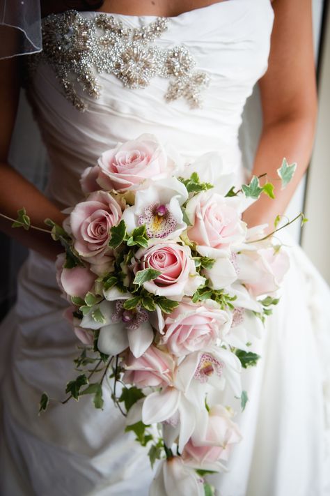 Pink And Ivory Bridal Bouquet, Pink Cascade Bouquet, Pink Wedding Bouquets Bride, Cascading Wedding Bouquets Pink, Pink Wedding Bouquet Ideas, Bridal Bouquet With Orchids, Bride Bouquet Pink, Bride Holding Bouquet, Trailing Bouquet