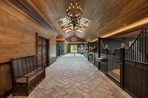 Stunning horse barn interior - Inspiro 8 Studios Photography Horse Barn Interior, Luxury Horse Stables, Covered Arena, Luxury Horse Barns, Luxury Horse, Stable Style, Horse Barn Ideas Stables, Timber Truss, Cedar Walls