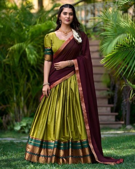 "Wrap yourself in the richness of South Indian heritage with our stunning Poly Cotton Half Saree, beautifully paired with a flowing Georgette Dupatta. A perfect blend of traditional charm and modern elegance. #weareffortlessly #SouthIndianChic #HalfSareeGoals #PolyCottonPerfection #GeorgetteDupatta #TraditionalElegance #ModernTwist #EthnicFashion #HeritageWear" Catalogue : DHRUVIKA Lehenga(Stitched) Lehenga Fabric : Poly cotton Lehenga Work : Zari Weaving Work Lehenga Waist : SUPPORTED UP ... Festive Lehenga With Zari Weaving, Cheap Unstitched Blouse Piece For Traditional Ceremonies, Traditional Saree With Padded Blouse At Cheap Price, Cheap Traditional Padded Blouse Piece, Half Saree Designs South Indian, Green Half Saree, Lehenga Stitched, Half Saree Function, Wedding Lehenga Choli