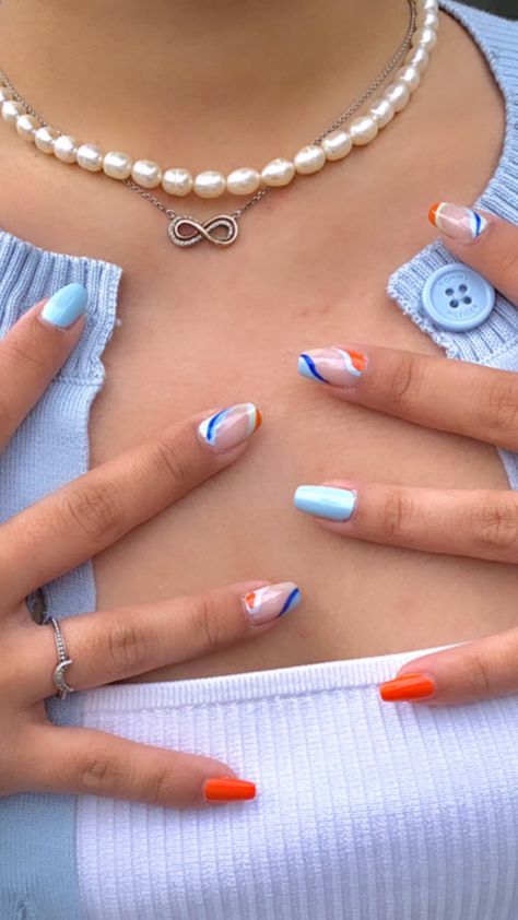 Orange Blue And Yellow Nails, Nails Acrylic Orange And Blue, Short Blue And Orange Nails, White Orange And Blue Nails, Navy Blue And Orange Nail Designs, Orange Blue And White Nails, Orange Blue White Nails, Orange And Light Blue Nails, Blue Orange And White Nails