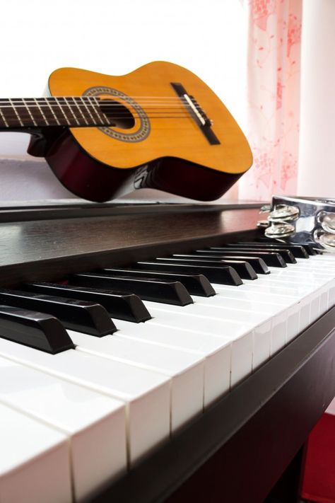 Teclado de piano con guitarra y panderet... | Premium Photo #Freepik #photo #fondo #musica #madera #arte Piano Art, Bunny Wallpaper, Key To My Heart, Light Academia, Musical Instrument, Premium Photo, Ukulele, Music Art, Musical Instruments