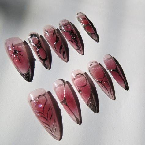 This design has a cool gothic y2k look.    It's high quality, reusable, and 100% handmade! The design might be slightly different due to the shapes. I'll manage to make them all look gorgeous.   The package includes: - The nail set with 10 pieces. (Maximum 2 simple design spare nail tips to replace, if there are 3d or anime art) - Prep kit: mini file, buffer, glue, adhesive tabs, wooden stick, alcohol pad. - Instructions. Due to the sanitary reason, unfortunately, I cannot offer returns or exchanges . Order Cancellation: - All orders are made to order and tailored to your specifications. You have a 6-hour window from the time of order placement to cancel your order. After this period, orders cannot be canceled as I begin crafting your unique nails promptly. Defective or Damaged Items: - If Chrome Jelly Nails, Pink And Chrome Nails, Chrome Nails Y2k, Purple Y2k Nails, Nail Art Unique, Jelly Nail Art, Nail Jelly, Y2k Chrome, Nail Purple