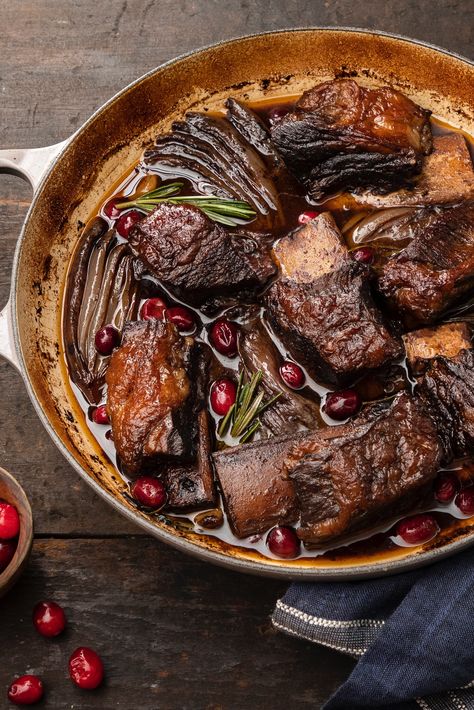 The ultimate comfort food, Balsamic Rosemary Braised Short Ribs with Cranberries become meltingly tender when braised for hours in a bath of red wine and balsamic vinegar. They would make the perfect meal for a cozy, Sunday supper, especially when served with buttery mashed potatoes to soak up every bit of the sauce. Le Creuset Braiser, Cast Iron Braiser, Le Creuset Recipes, Buttery Mashed Potatoes, Culinary Techniques, Braised Short Ribs, Frozen Cranberries, Braised Beef, Beef Short Ribs