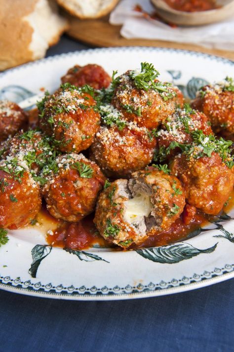 Delicious meatballs stuffed with hot bocconcini cheese. This recipe is a hearty winter classic, and it is made even better with Rosa's famous homemade Napoletana sauce. Brie Stuffed Meatballs, Bocconcini Recipes, Napoletana Sauce, Meatballs In Red Sauce, Arancini Balls, Baked Italian Meatballs, Delicious Meatballs, Matzo Balls, Stuffed Meatballs