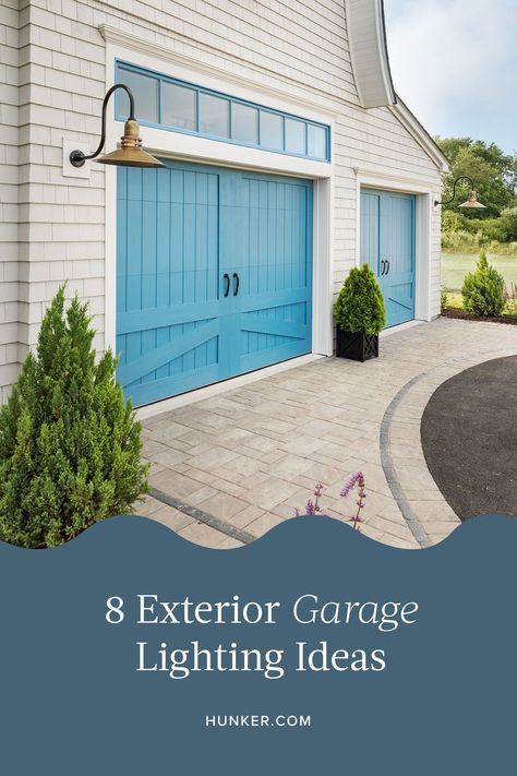 Quality outdoor lighting can improve safety and enhance how your abode looks to others. So here are eight exterior garage lighting ideas to help make your carport glow. #hunkerhome #exteriorlighting #garage #garagelighting #exteriorlightingideas Garage Lighting Exterior, Exterior Garage Lighting, Garage Exterior Lighting, Carport Lighting Ideas, Garage Exterior Lights, Carport Lighting, Exterior Lighting Ideas, Garage Lights Exterior, Garage Lighting Ideas