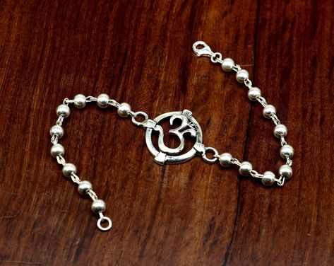 Buy 7.5 Inches Long Handmade Solid 925 Sterling Silver Custom Aum online on Etsy India. Shop for handmade, vintage and unique Rakhis items from TribalOrnaments online on Etsy Rudraksha Rakhi, Silver Rakhi, Girly Bracelets, Rakhi Design, Bracelets Design, Design Bracelet, Precious Jewels, Unisex Jewelry, Silver Gifts