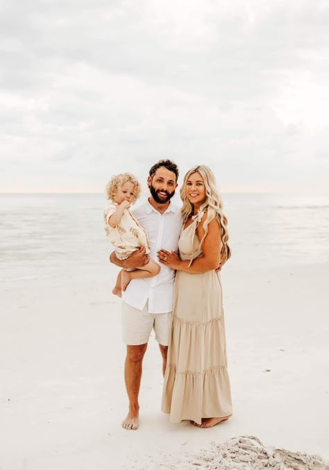 Beach Pictures Family Of 3, First Birthday Photo Shoot Beach, Family Photoshoot Beach Ideas, Tan Family Photo Outfits, Casual Beach Family Photos, Family Beach Photos Outfits, Family Photo Outfits Beach, Beach Pics Poses, Family Photo Color Palette