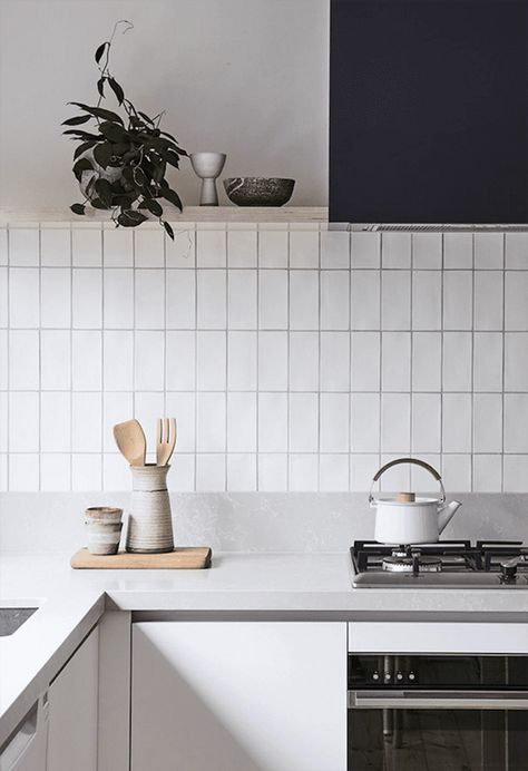 19 Stunning Ways to Use Subway Tile in the Kitchen Scandinavian Kitchen Tiles Wall, Bicker Design, Dapur Skandinavia, White And Grey Kitchen, Style Curator, Countertop Inspiration, Subway Tile Patterns, White Kitchen Splashback, Kitchen Splashback Tiles