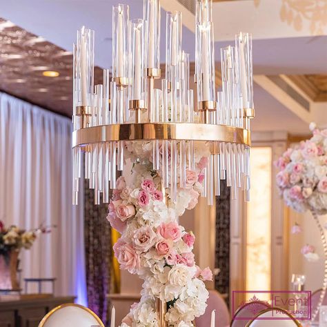 wedding decoration luxury new design large crystal tube gold metal standing candelabra https://m.alibaba.com/product/1600602931250/wedding-decoration-luxury-new-design-large.html?__sceneInfo={"cacheTime":"1800000","type":"appDetailShare"} Wedding Dining Table, Candelabra Wedding Centerpieces, Glass Vases Wedding, Chandelier Centerpiece, Gold Candelabra, Candelabra Wedding, Candelabra Centerpiece, Wedding Dining, Beach Wedding Centerpieces