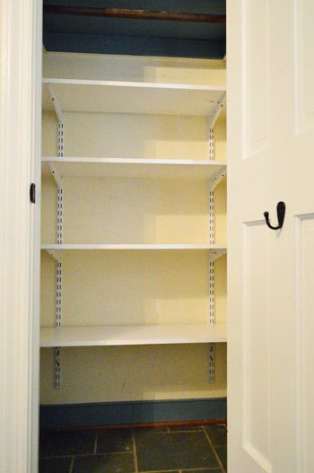 Who Needs Coats When You Can Have Toys? | Young House Love - I need to put shelves in our game closet Turning Coat Closet Into Storage, Hall Closet Toy Storage, Toy Closet Shelves, Hall Closet Shelf Ideas, Rubbermaid Shelving Ideas, Coat Closet To Linen Closet, Track Shelving Closet, Toy Closet Shelving Ideas, Adding Shelves To Closet