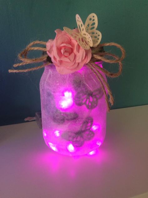 Butterfly jar with pink fairy lights https://m.facebook.com/jocraftyglass/ Pink Fairy Lights, Butterfly Jar, Jar Centerpieces, Pink Fairy, Mason Jar Centerpieces, Jar Lights, Bottles And Jars, Twinkle Lights, Gifts Ideas