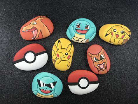 Some new Pokémon rocks I made Pikachu Rock Painting, Pokemon Rocks Painting, Rock Painting Pokemon, Pokemon Stones, Pokemon Dragon, Lilo And Stitch Drawings, Pokemon Craft, Pokemon Birthday Party, Stitch Drawing