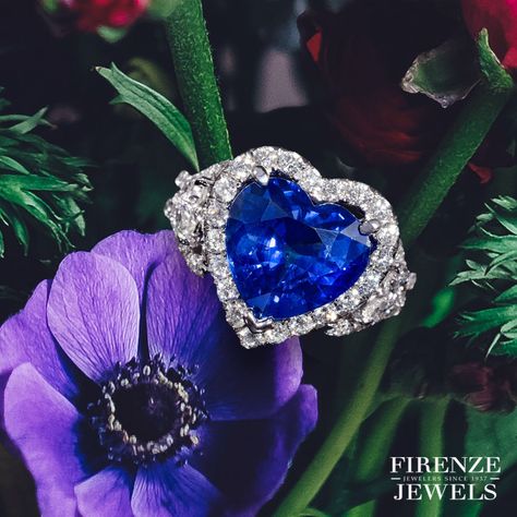 🔥 Ignite the flames of passion & let the world be captivated by the mesmerizing dance of this 💙 heart-shaped sapphire & diamond ring. 💎 #FIRENZEJEWELS style 8395 sparks brilliantly with 1 blue heart sapphire stone weighing 5.44 carats & round brilliant cut white diamond weighing 1.30 carats, all arranged in an 18k white gold ring design. #firenzejewels #jewellery #diamonds #jewelleryshop #jewellerydesign #engagement #weddingday #engagementideas Blue Sapphire Heart Cut Ring, Sapphire Diamond Rings Heart Shaped, Luxury Fine Jewelry Heart Shaped Sapphire Ring, Luxury Elegant Heart-shaped Sapphire Ring, Luxury Heart-shaped Sapphire Ring With Brilliant Cut, Gold Ring Design, Jewellery Diamonds, Blue Sapphire Ring, Gold Ring Designs