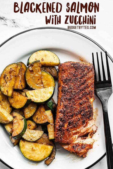 Blackened salmon coated in Cajun spices, cooked to perfection in butter, and paired with simple sautéed zucchini makes a simple but delicious dinner! Budgetbytes.com Salmon With Zucchini, Sautéed Zucchini, Easy Skillet Dinner, Homemade Cajun Seasoning, Blackened Salmon, Budget Bytes, Soy Free Recipes, Salmon Seasoning, Egg Free Recipes