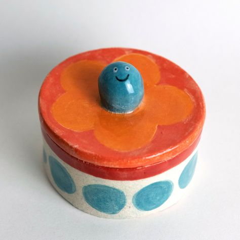 "What about a ceramic trinket box to keep your jewellery and small tiny things? This one is a handmade and hand painted small trinket box with lid I did myself in stoneware clay. It's a special item that will look really well in your home. It's also a cool engagement ring box or a gift idea for sister, mom or girlfriend! ⦁⦁ MAIN FEATURES ⦁⦁ Size: 80x80x45mm Clay: Stoneware clay Technique: slabs, underglaze and brush glazing Glaze: This glaze has \"craquelure\", the small decorative little cracks on the glaze. It's a beautiful decorative glaze! This means that the piece will absorb water. I don't recommend you use it to drink tea or any liquids) It was meant as a decorative piece only.  Made in Portugal Important Note: All my ceramic products are handmade from the beginning to the end so do Ceramic Trinket Dish With Lid, Air Dry Clay Box With Lid, Trinket Box Clay, Pottery Jewellery, Ceramic Slab Ideas, Ceramics Box Ideas, Ceramic Boxes With Lid, Ceramic Trinket Dish, Ceramic Jewelry Box