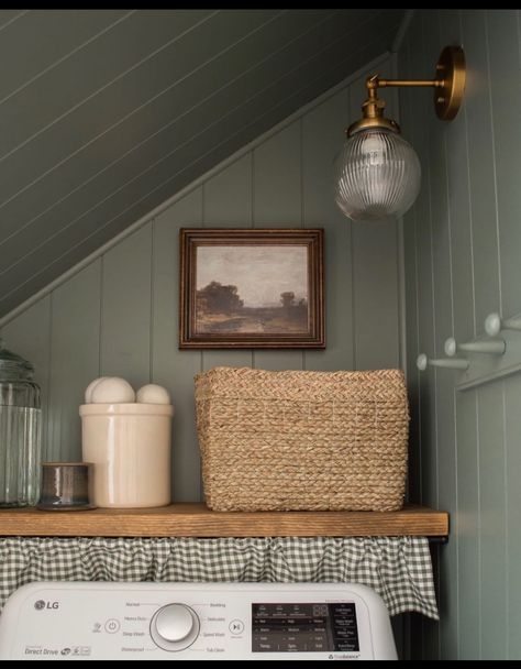 Small Cozy Laundry Room, Victorian Style Laundry Room, Laundry Room Antique Cabinet, Moss Green Laundry Room, Laundry Room Wood Paneling, Small Cottage Laundry Room, Nancy Meyers Laundry Room, Attic Laundry Room, Cozy Laundry Room Ideas