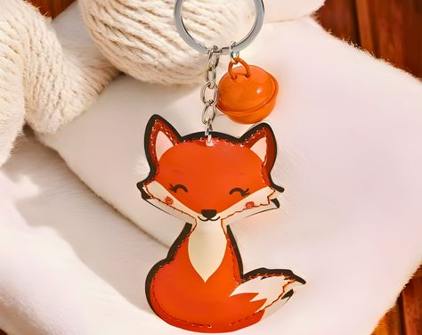 Add a touch of whimsy and elegance to your accessories with our **Genuine Leather Fox Keychain 🦊✨ Expertly crafted from premium leather and featuring a charming cartoon fox design, this keychain is a delightful addition to any handbag or set of keys. The small metal bell pendant adds a playful jingle, making it even more special. ✨Dimensions✨ Length & Width of Charm: 13 cm x 5 cm 📦 SHIPPING & PROCESSING 📦 ✅Processing time will be approximately 1-4 days ✅Shipping time will be approximately 3-1 Fox Keychain, Animal Keychain, Keychain Leather, Animal Bag, Fox Design, Bell Pendant, Leather Keychain, Gift For Her, Genuine Leather