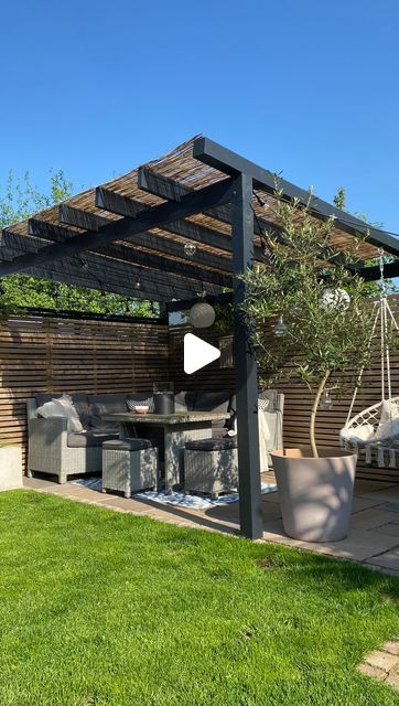 Sarah | Interiors & DIY on Instagram: "DIY pergola

It’s almost 3 years since we made our own pergola. Unable to find a kit to fit the corner as we wanted, we headed off to our local timber yard, put pen to paper and created a simple structure. We then painted it black and added some reed-on-a-roll to create shade, with corrugated plastic over the top to make the area waterproof. Now we are able to enjoy the space throughout the summer months, regardless of the weather 🖤

Pergola is painted in Off-Black exterior eggshell by @farrowandball (previously declared gift)

#projectgarden #gardenproject #gardenideas #gardeninspo #gardendesign #gardendiy #diypergola #gardenpergola #pergola #gardenrenovation #patiofurniture #patioinspro #gardenpatio #southfacinggarden #gardening #gardenplants #love Small Urban Garden Design, Small Urban Garden, Urban Garden Design, Privacy Landscaping, Pergola Ideas, Pergola Design, Balkon Design, Diy Pergola, Pergola Designs