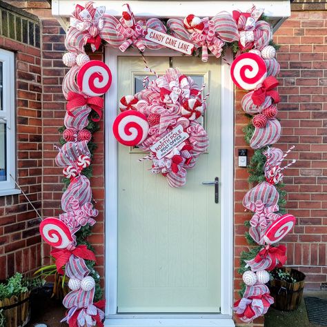 CHRISTMAS IS OFFICIALLY OPEN BE THE FIRST TO GRAB YOUR CHRISTMAS GARLANDS, AND SECURE YOUR PLACE. IF YOU ARE LOOKING FOR A DOOR GARLAND IN A DIFFERENT THEME OR STYLE PLEASE MESSAGE THE PAGE https://www.stassisbespokecreations.co.uk/store/prod_8093778-18ft-Candy-Cane-Front-door-Christmas-Garland.html#productBasket Christmas Door Garland, Candy Cane Garland, Front Door Garland, Outdoor Christmas Garland, Large Front Door, Door Garland, Garland Wreath, Wedding Flower Packages, Christmas Garlands