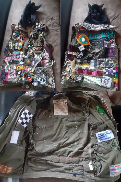 A dark green vest covered in colorful queer and rebellious patches and pins, as well as bits and baubles including old necklaces, can tab chains, charms, keys, buttons, safety pins and fidget toys Pride Battle Jacket, Queer Battle Jacket, Punk Vest Ideas, Punk Vest Diy, Battle Vest Punk, Battle Vest Outfit, Crust Vest, Battle Vest Ideas, Alt Jacket