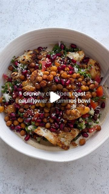 Tess Begg on Instagram: "The most delicious nourish bowl👇🏼😍 Crunchy chickpeas, roast cauliflower, tabouli style salad, pomegranate and sesame on a bed of creamy hummus! This might be the best one yet 🥹

If you haven’t checked out my previous nourish bowl recipes, save this video for later and go watch!

Makes 2 

Chickpeas:
2 cups canned chickpeas, drained and rinsed
Drizzle of olive oil
1 tsp onion powder
1 tsp garlic powder
1 tsp cumin
1 tsp smoked paprika
Pinch of salt and pepper

Cauliflower:
1 head of cauliflower cut into smaller pieces
Drizzle of olive oil
1 tsp onion powder
1 tsp cumin
1 tsp smoked paprika
Pinch of salt and pepper

Tabouli style salad:
1 bunch curly parsley, finely chopped (about 2 cups)
1/2 red onion, finely diced
1-2 tomatoes, finely diced
1 cucumber, finely d Nourish Bowl Recipes, Oven Cauliflower, Salad Pomegranate, Tess Begg, Curly Parsley, Roast Cauliflower, Cauliflower Hummus, Hummus Bowl, Sausage Balls Recipe