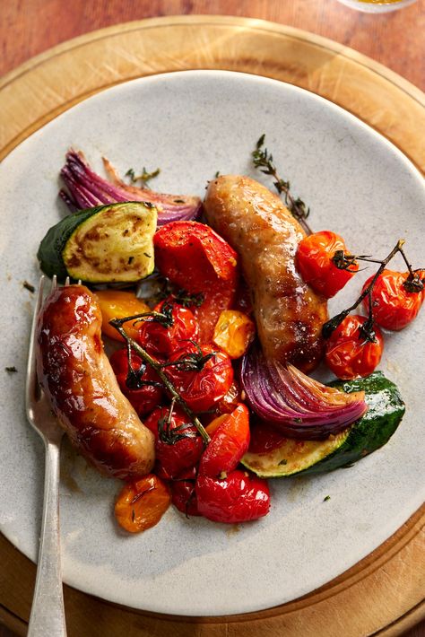 This delicious sausage traybake recipe is the perfect Summer traybake. With lovely punchy flavours from the balsamic vinegar and our British sausages, this is a simple yet delicious one to try when you're looking for sausage recipes for dinner. Give this a try with sausage and peppers or any veg you have!   #sausages #sausage #traybake #roastedveg #roastedvegetables #britishsausages #britishfood #balsamicvinegar #sausageandpeppers #peppers #sausagerecipe Traybake Recipes Savoury, Tray Bakes Dinner, Recipes For Dinner Sausage, Sausage Traybake, British Sausage, Sausage Sandwich Recipes, Orzo Pasta Recipes, Sausage Recipes For Dinner, Dinner Sausage