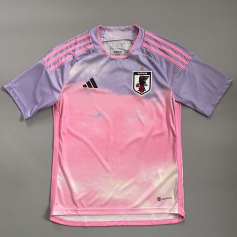 Get ready for the 2023 World Cup with this Japan Jersey Team 2023 Away Soccer Shirt for Kids! 🇯🇵⚽💖 Made with 100% recycled polyester interlock and officially licensed by adidas, this jersey is perfect for young soccer fans. Available in children's size M with a regular fit, short sleeves, and in a striking pink color. 🙌 #JapanTeam #WorldCup2023 #AdidasJersey #KidsSoccer #RecycledPolyester #SoccerFans 🤩 Japan Football Jersey, Pink Football Shirt, Japan Jersey, France Soccer Jersey, Soccer Clothes, Japan Soccer, Pink Football, Football Jersey Shirt, Jersey Pink