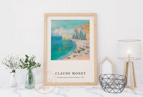 Monet’s The Beach and the Falaise d’Amont Print. This piece of art was painted by Claude Monet in 1885. The original painting, “Étretat: The Beach and the Falaise d’Amont,” was oil on canvas. This stunning print would look great as wall art in any modern home, especially in a living room or bedroom. It would also make a perfect addition to a fine art or beach themed gallery wall. Themed Gallery Wall, Beach Themed, Affordable Wall Art, Claude Monet, Glossy Paper, Poster Making, Beach Themes, Wall Art Print, Modern Home