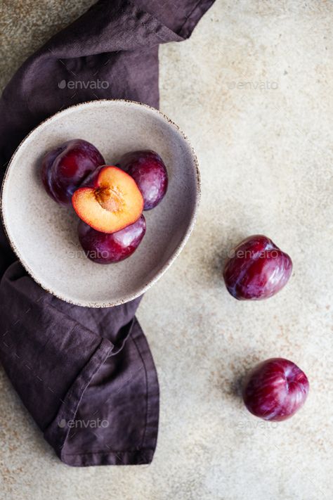 Top view of purple plum in a ceramic bowl on a beige textured background. by Edalin. Top view of purple plum in a ceramic bowl on a beige textured background. #AD #plum, #ceramic, #purple, #Top Plum Photography, Purple Food, Plum Fruit, Food Illustration Art, Still Life Fruit, Fruit Photography, Fresh Figs, Purple Plum, Beautiful Fruits